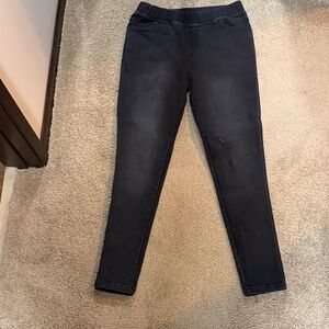 stretch jean jeggings , black in color with a bit of a distressed look !!